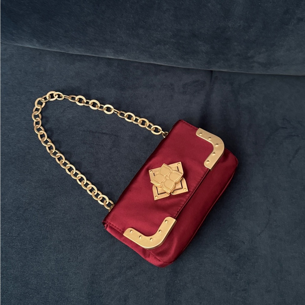BCBGMaxAzria Burgundy Nylon/Satin
Clutch With Gold‎ Hardware
